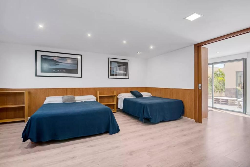 Habitación con acceso directo a la terraza exterior del Chalet Treviso